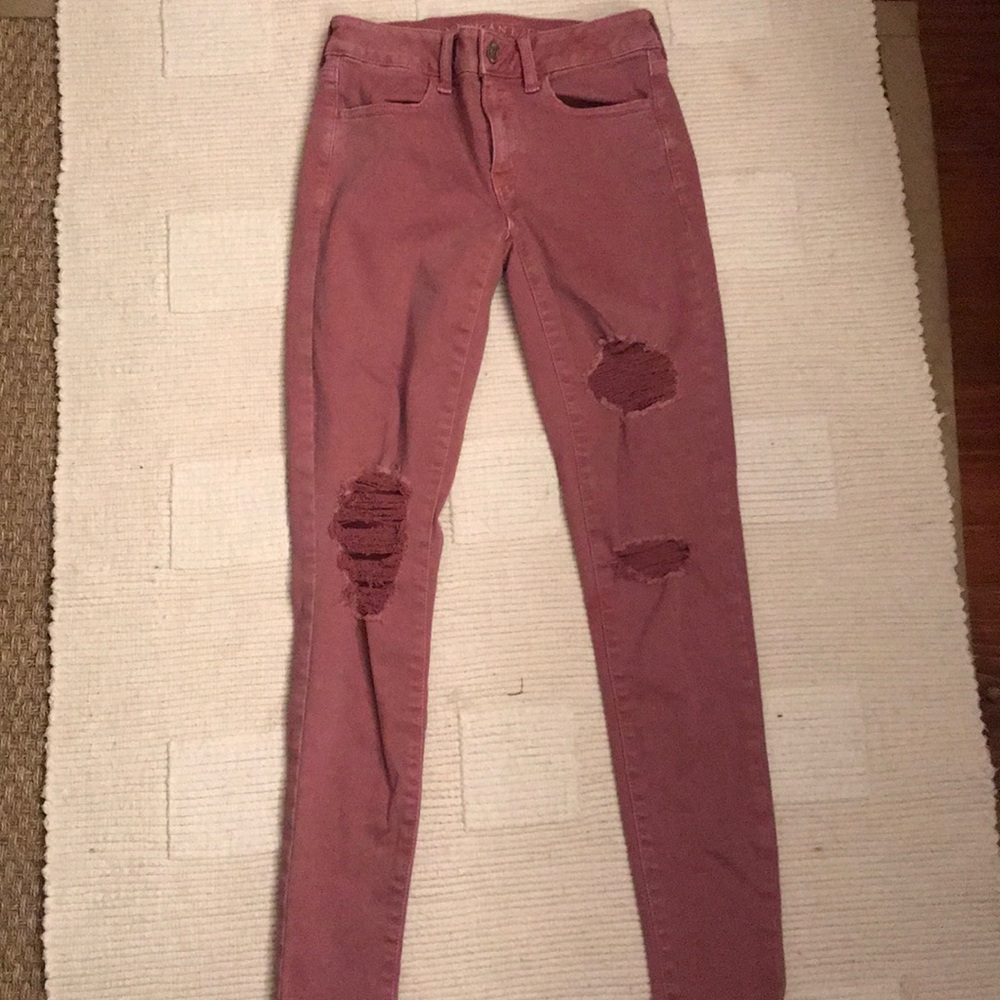 maroon american eagle ripped jeggings